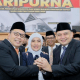 Momen Danny Pomanto, Aliyah Mustika Ilham, dan Munafri Arifuddin foto bersama usai penetapan Wali Kota dan Wakil Wali Kota Makassar di DPRD Kota Makassar, beberapa waktu lalu.
