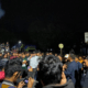Bupati Luwu Patahudding Patahudding saat berdialog dengan massa aksi Presidium Rakyat Tana Luwu di Bukit Sampoddo, Kota Palopo, Minggu (25/1/2026) dini hari.